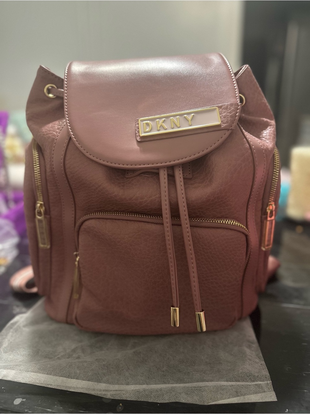 DKNY Mauve Pink Leather Drawstring Backpack with Gold Hardware